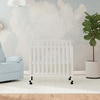 image:imageDavinci Dylan 3in1 Convertible Portable Mini Crib Espresso  GREENGUARD Gold Certified  Folding Baby Crib With Wheels 4 Adjustable Mattress Heights Conversion Kit Sold SeparatelyWhite