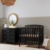 image:imageDavinci Dylan 3in1 Convertible Portable Mini Crib Espresso  GREENGUARD Gold Certified  Folding Baby Crib With Wheels 4 Adjustable Mattress Heights Conversion Kit Sold SeparatelyEbony