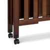 image:imageDavinci Dylan 3in1 Convertible Portable Mini Crib Espresso  GREENGUARD Gold Certified  Folding Baby Crib With Wheels 4 Adjustable Mattress Heights Conversion Kit Sold SeparatelyEspresso