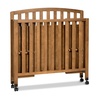 image:imageDavinci Dylan 3in1 Convertible Portable Mini Crib Espresso  GREENGUARD Gold Certified  Folding Baby Crib With Wheels 4 Adjustable Mattress Heights Conversion Kit Sold SeparatelyChestnut