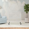 image:imageDavinci Dylan 3in1 Convertible Portable Mini Crib Espresso  GREENGUARD Gold Certified  Folding Baby Crib With Wheels 4 Adjustable Mattress Heights Conversion Kit Sold SeparatelyWhite