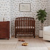image:imageDavinci Dylan 3in1 Convertible Portable Mini Crib Espresso  GREENGUARD Gold Certified  Folding Baby Crib With Wheels 4 Adjustable Mattress Heights Conversion Kit Sold SeparatelyEspresso