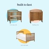 image:imageDavinci Dylan 3in1 Convertible Portable Mini Crib Espresso  GREENGUARD Gold Certified  Folding Baby Crib With Wheels 4 Adjustable Mattress Heights Conversion Kit Sold SeparatelyChestnut