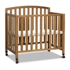 image:imageDavinci Dylan 3in1 Convertible Portable Mini Crib Espresso  GREENGUARD Gold Certified  Folding Baby Crib With Wheels 4 Adjustable Mattress Heights Conversion Kit Sold SeparatelyChestnut