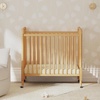 image:imageDavinci Jenny Lind 3in1 Convertible Mini Crib Honey  GREENGUARD Certified Mini Crib w Removable Wheels Converts to Toddler Bed amp Daybed w 4 Adjustable Mattress Heights